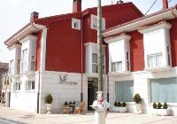 Hotel Asador H.M. Versus